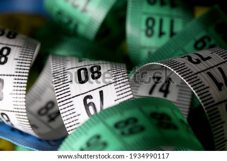 measuring tape on black background