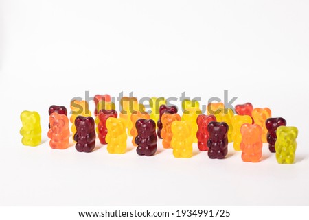 colourful sweet gummy bears isolated on white background.