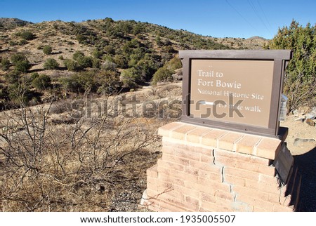 Sign from the parking area directs visitors to Fort Bowie National Historical Site in Arizona. Fort Bowie was a 19th-century outpost of the United States Army. A hike is necessary to get to the site.