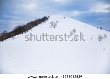 Beautiful view of the mountains with snow of Lombardy (Italy)