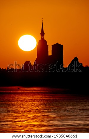 silhouette of city of Stralsund with sunset