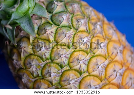 Ananas comosus in fresh market. (Macro picture)