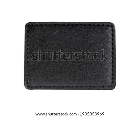 Black leather patch isolated white background.Clipping path Royalty-Free Stock Photo #1935053969
