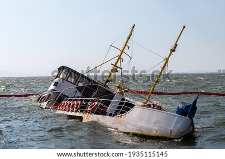 passenger steamer that sank while berthed Royalty-Free Stock Photo #1935115145