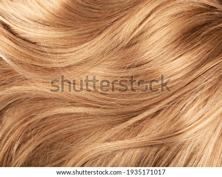 Long blond human shiny hair background