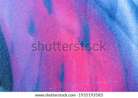 Art under ground. Beautiful street art graffiti background. The wall is decorated with abstract drawings house paint. Modern style urban culture of street youth. Abstract picture on wall Royalty-Free Stock Photo #1935193583