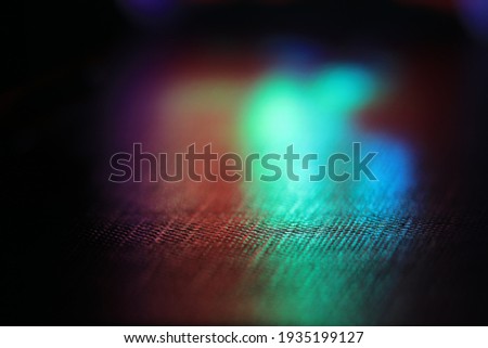 Color light reflection in textured surface