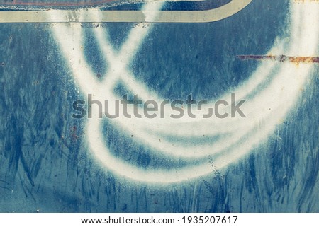 White curved lines on a blue background