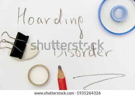 Hoarding disorder concept, mental health problem when people collect different useless things and waste and bring them home, a sign surrounded with junk.