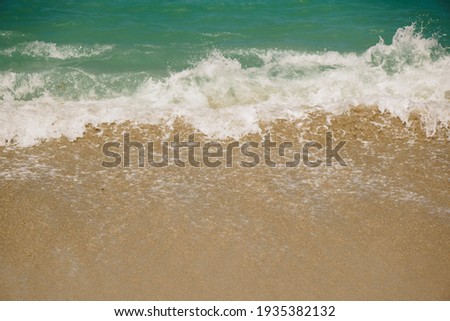 Soft Waves or Crashing Waves on The Beach, White Waves Foam and Bubbles (Wedi Ireng Beach, Banyuwangi Indonesia)