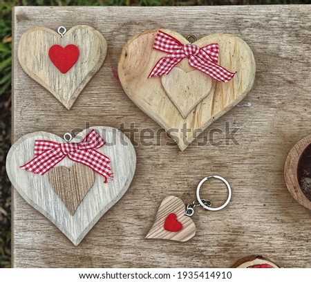 Close up of hand carved wooden hearts