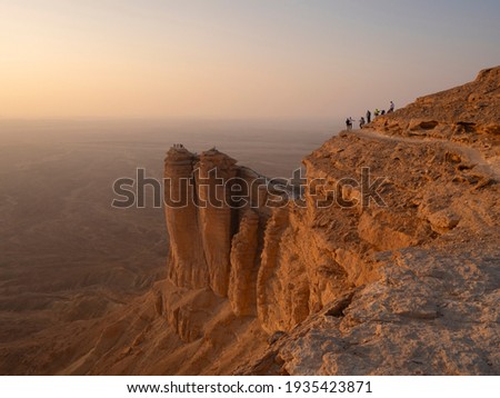 Sunset views at the Edge of the World escarpment tourist area near Riyadh, Saudi Arabia Royalty-Free Stock Photo #1935423871