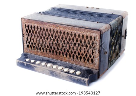 Old vintage piano accordion  isolated over white background . 