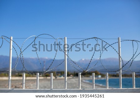 Fence with barbed wire on the border with Abkhazia