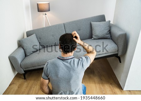 Lack Of Space Interior Design Mistake. Sofa Furniture Does Not Fit Royalty-Free Stock Photo #1935448660