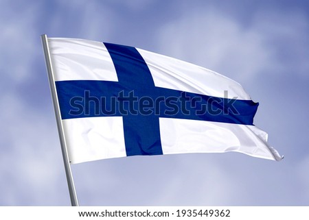 Finland flag isolated on sky background. close up waving flag of Finland. flag symbols of Finland.