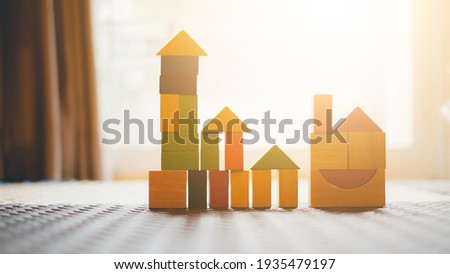 Wooden house and blurred background. Concept for business and banking.
