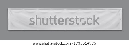 PVC advertising banner with eyelets Royalty-Free Stock Photo #1935514975