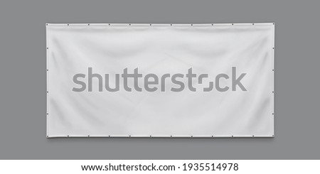 PVC advertising banner with eyelets Royalty-Free Stock Photo #1935514978