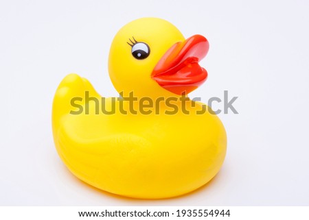 Yellow rubber duck for a kid's bath time, isolated on white background