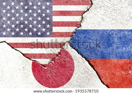 Faded USA VS Russia VS Japan national flags icon on broken weathered wall with cracks, abstract international country political economic relationship conflicts pattern texture background wallpaper