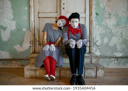 Two clowns, mime artists, parody comedy