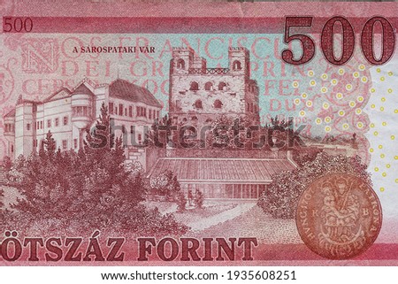 Close-up macro photo of a 500 forint Hungarian banknote. The banknote shows small details. Bank image and photo.