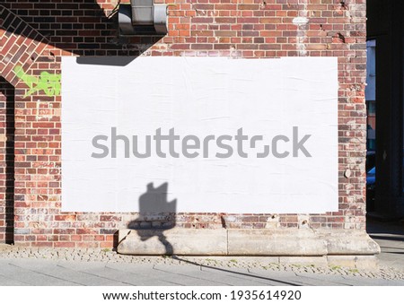 White wrinkled poster template. Glued paper mockup. Blank wheatpaste on textured wall. Empty street art sticker mock up. Clear urban glued advertising canvas. Billboard advertisment advertiser. Royalty-Free Stock Photo #1935614920
