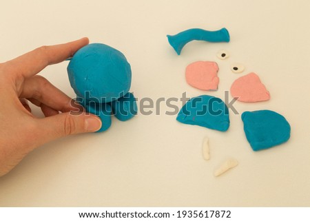 Making elephant game step by step with play dough for children's activity in the school art lesson and plasticine concept.