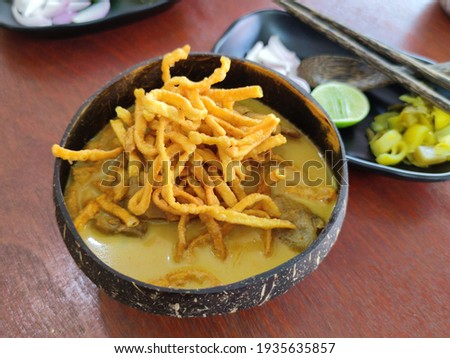 Khao Soi Gai in a corner shell, pictured above.