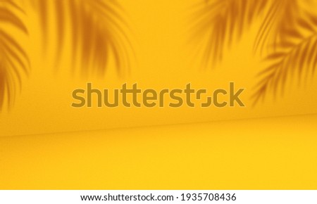Empty palm shadow yellow color texture pattern cement wall background. Used for presentation  business nature organic cosmetic products for sale shop online. Summer tropical beach with minimal concept Royalty-Free Stock Photo #1935708436