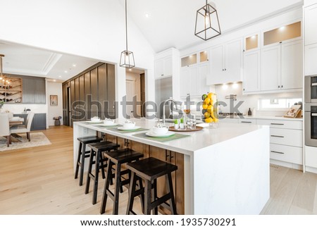bright, spacious and modern farmhouse style kitchen Royalty-Free Stock Photo #1935730291