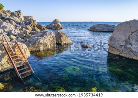 Staircase going into the sea