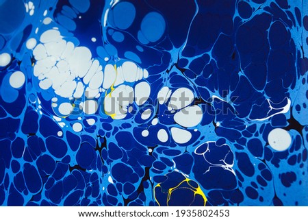 Ebru - painting on water, drawing blue star sky without a sketch