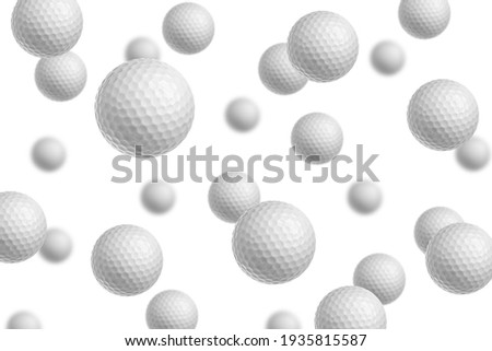 Falling Golf ball isolated on white background, selective focus
