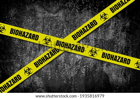 Biohazard restricted area, grunge background. Biologic hazard, pathogen, infectious, contamination, pandemic, health risk concept background. Royalty-Free Stock Photo #1935816979