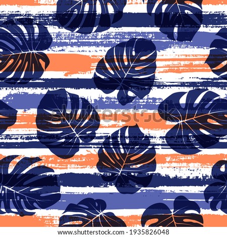 Tropical monstera philodendron liana hole leaves over painted stripes seamless pattern design. Polynesian jungle foliage swimwear textile print. Floral tropical leaves seamless design.