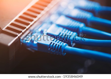 Router Wi-Fi close up. Fast internet modem device. Wireless or wired network Royalty-Free Stock Photo #1935846049