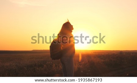 happy girl teen child closed her eyes dream. teenage kid wants a dream come true portrait at sunset. woman daughter silhouette dream of a happy childhood. free face sister closed eyes Royalty-Free Stock Photo #1935867193
