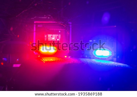 Abstract blurred background with flasher in the dark. Special signals of emergency services. Accident concept. Copyspace for text or inscription