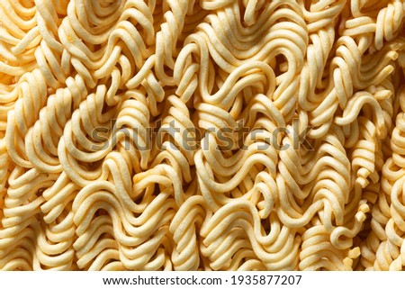Texture of instant noodles close up,Japanese Food,Close To,Noodles,Pasta,Above,Abstract,Asia,Asian Food,Backgrounds,Block Shape,Built Structure,Cereal Plant,Chinese Culture,Close-up,Color Image,Curve,