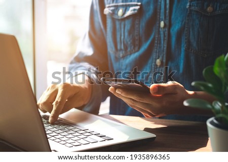 Work using mobile phone typing computer mobile chat laptop contact us at workplaces, planning ideas investors internet searching, ideas connecting people. Royalty-Free Stock Photo #1935896365