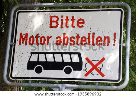 Please, stop engine. Traffic sign in the Rothenburg ob der Tauber bus parking lot. Germany.