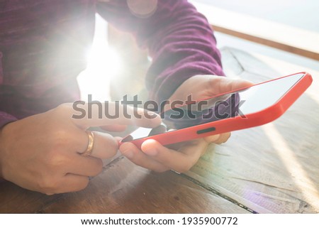 Woman using phone social connection, stock photo