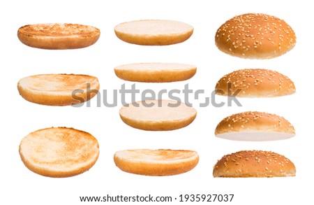 Set of burger bun isolated on white background. Different sides and parts Royalty-Free Stock Photo #1935927037