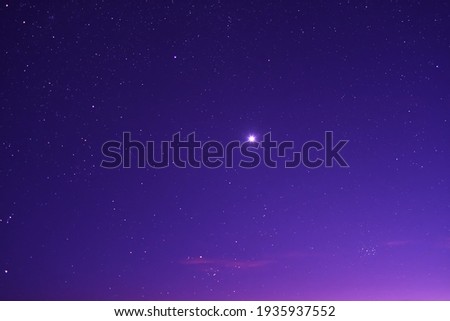 The night sky with Venus and Pleiades.
