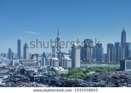 modern urban scene in shanghai, yuyuan garden and lujiazui financial center, beautiful metropolis background.