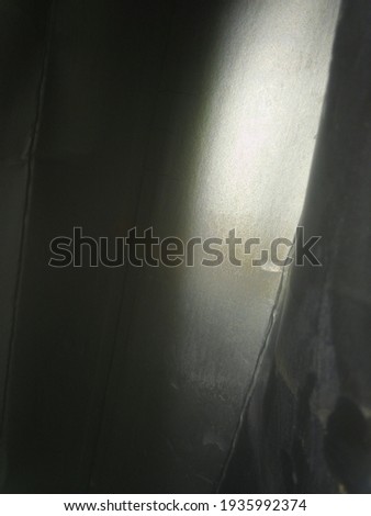 grey wallpaper with abstract forms and different lights and shadows