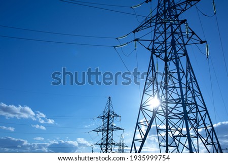 power line support with wires for electricity transmission. High voltage grid tower with wire cable at distribution station. energy industry, energy saving Royalty-Free Stock Photo #1935999754