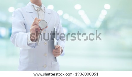 Doctor at hospital ward bankground. healthcare and medical concept. Royalty-Free Stock Photo #1936000051